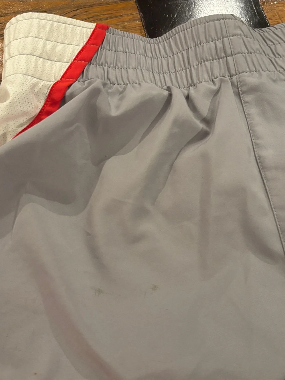 Nike Light Gray Athletic Shorts with Red Trim